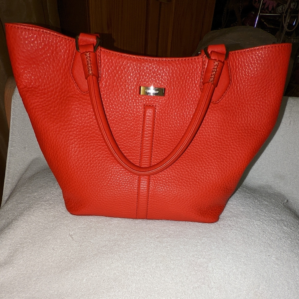 Cole Haan Village Serena red pebbled shoulder bag.